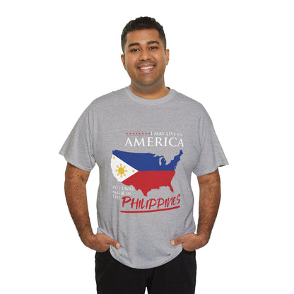 I may live in America but I was made in the Philippines (Gildan · 5000) Unisex Heavy Cotton Tee